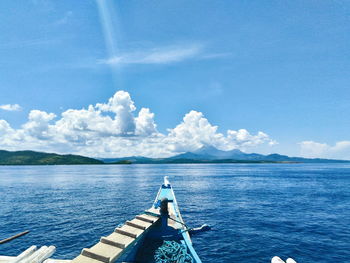 Scenic view of calm sea against blue sky