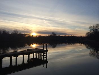 Sunset over calm lake