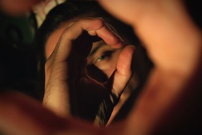 Close-up of woman holding hands