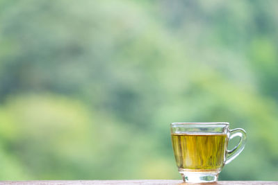 Close-up of tea in glass on table