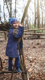 Full length of boy in forest