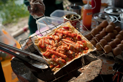 High angle view of meat on barbecue grill