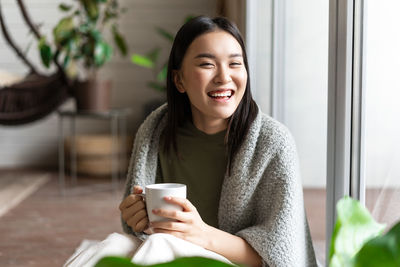 Young woman using mobile phone