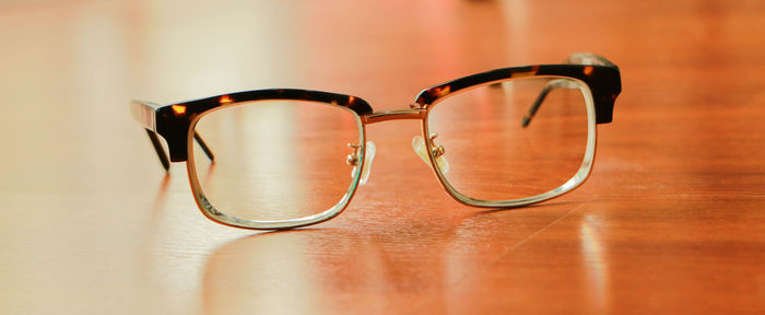 Close-up of eyeglasses on table