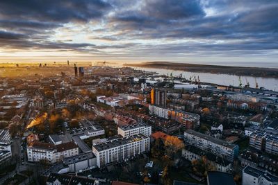 High angle view of city at sunset