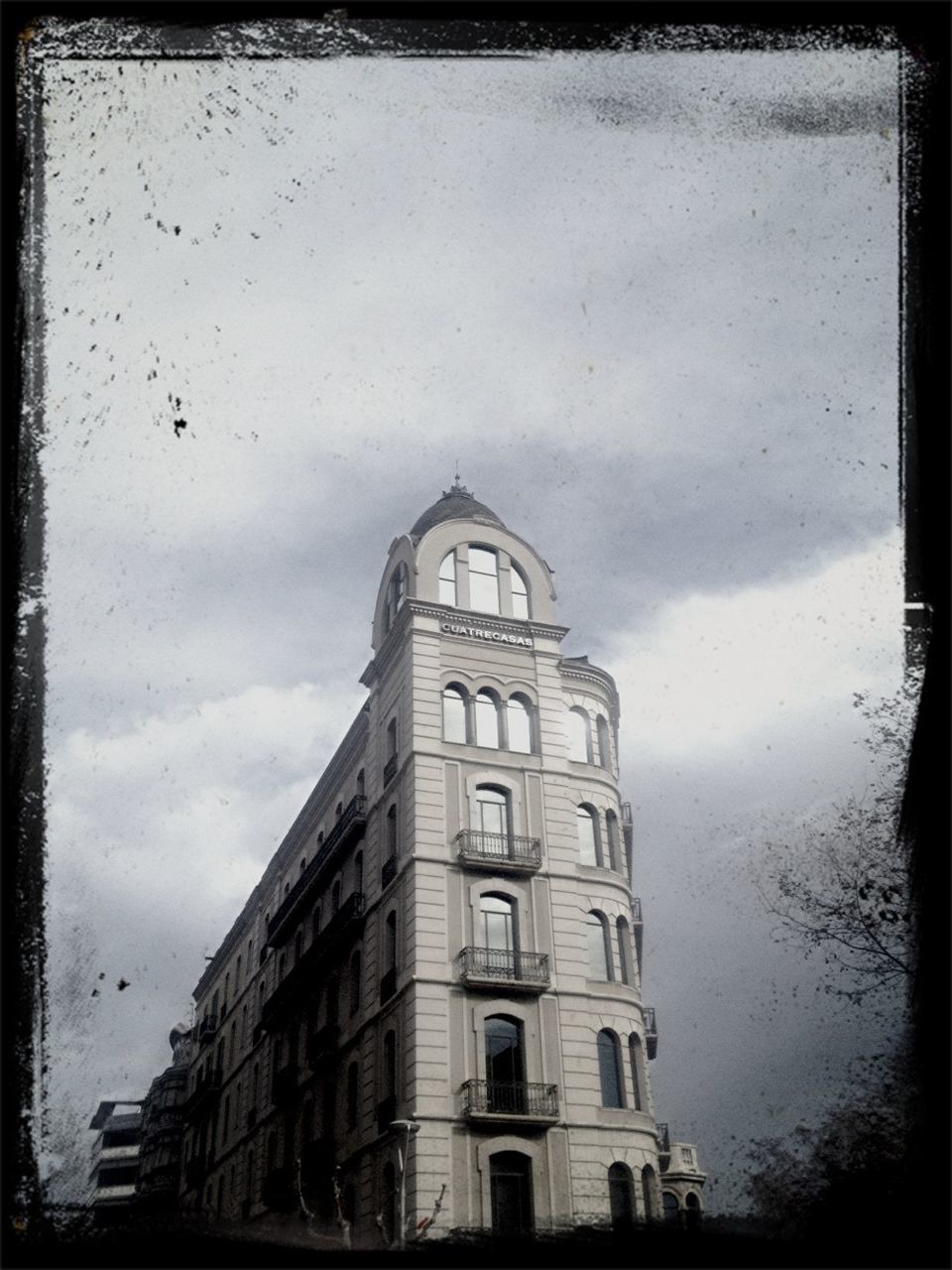 architecture, building exterior, built structure, sky, transfer print, church, religion, auto post production filter, low angle view, cloud - sky, place of worship, window, building, spirituality, tower, city, cathedral, cloudy