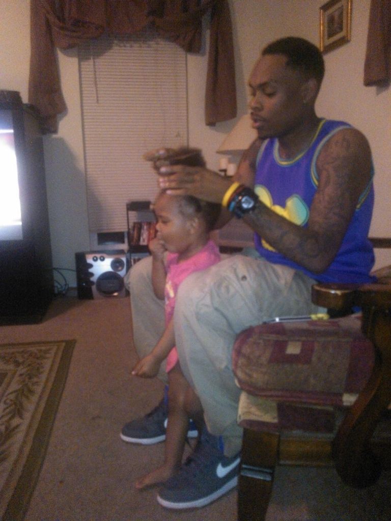 Brother Doing his Little Girls Hair