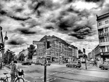 City street against cloudy sky