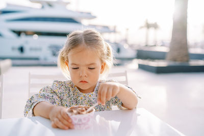 Portrait of cute girl looking away