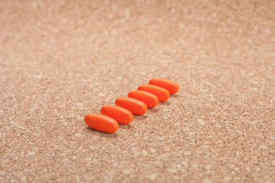 Close-up of orange sand on beach