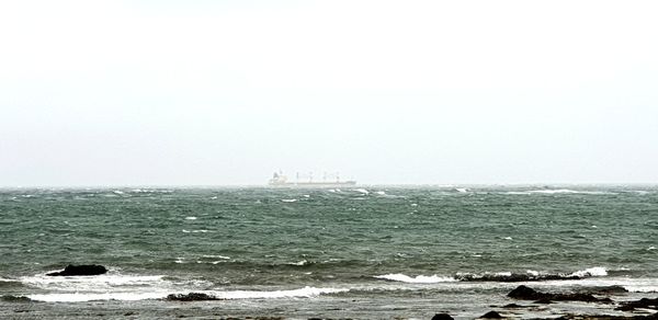 Scenic view of sea against clear sky