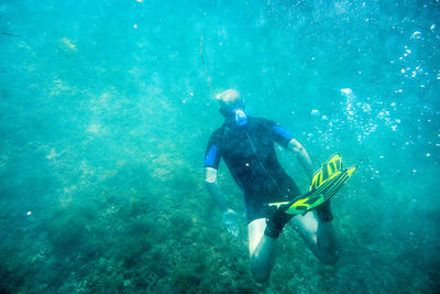 Man swimming in sea