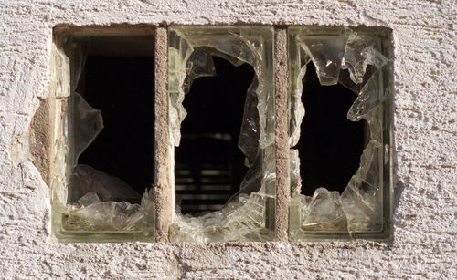 Close-up of damaged window