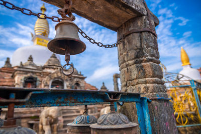 Close-up of bell tower against sky