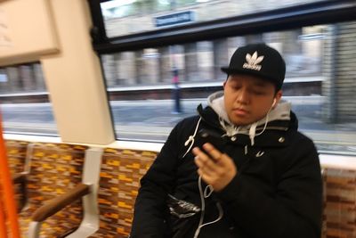 Man standing in bus