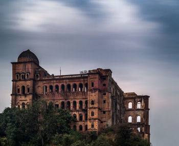 Low angle view of historical building against sky