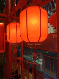 Illuminated lanterns hanging at night