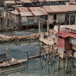 High angle view of houses and buildings in city