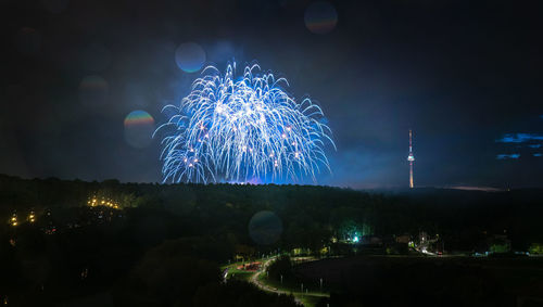 Firework display at night