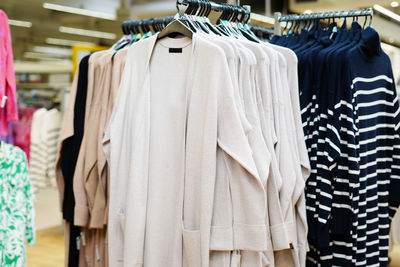 Close-up of clothes hanging on rack