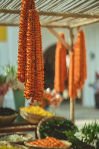 Close-up of bell hanging on table