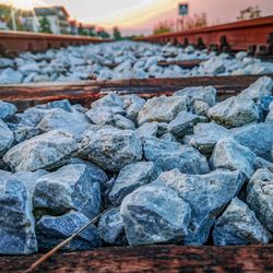 Close-up of stones on railroad track