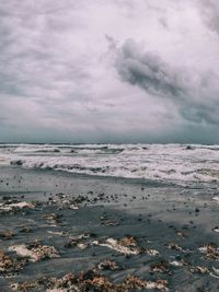 Scenic view of beach against sky