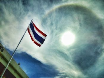 Low angle view of flag against sky