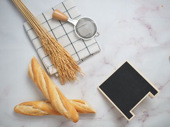 High angle view of food with slate on marble