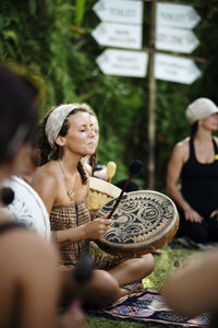 Musicians playing drums at event