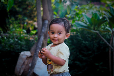 Portrait of cute boy looking away