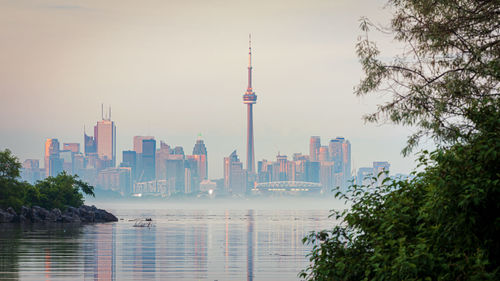 View of buildings in city against sky