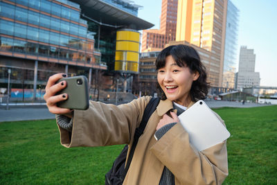 Young woman using mobile phone