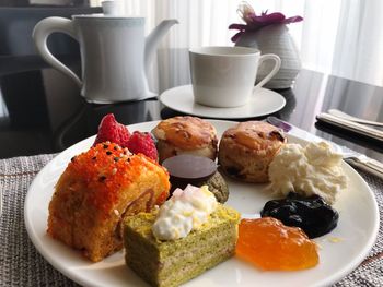 Close-up of breakfast served on table