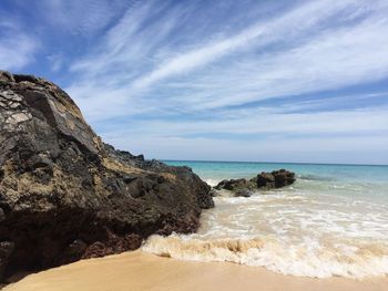 Scenic view of beach against sky