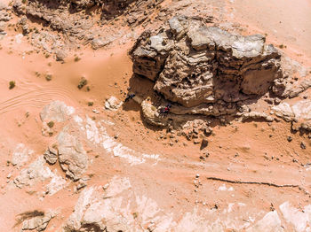 High angle view of rock formations in desert during sunny day