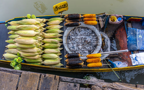 Corn for sale at boat market stall