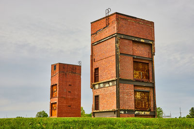 Low angle view of building against sky during sunset