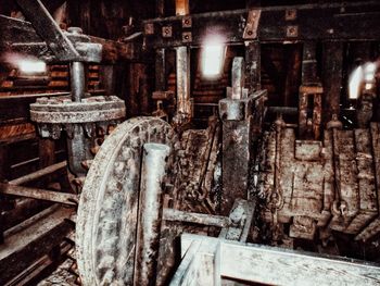 Close-up of machine part of abandoned factory