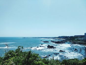 Scenic view of sea against clear sky