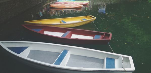 High angle view of boat moored at lake