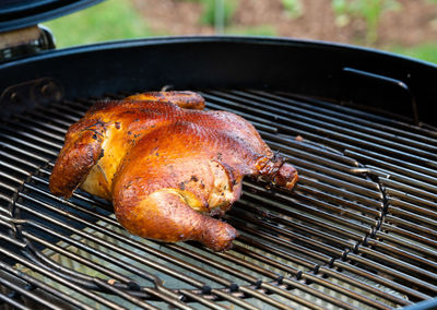 Close-up of meat on barbecue grill