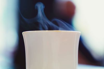 Close-up of steam moving up from cup