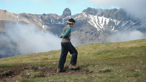 Young woman standing on mountain