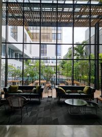 Empty chairs and tables in restaurant