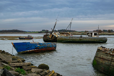 Boat in sea against sky