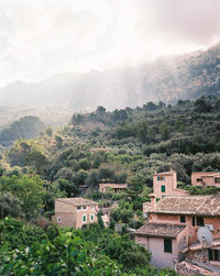 High angle view of townscape against mountains