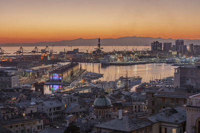 High angle view of city at sunset