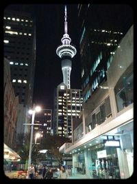 Low angle view of modern building at night
