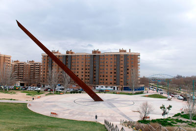 View of playground against buildings in city